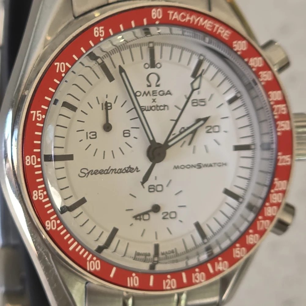 Swatch elegant omega